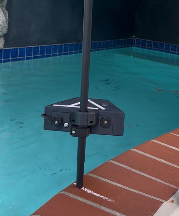 Trigonon-Device-measuring-grotto-in-pool Trigonon device measuring the inside of a grotto in a swimming pool using modern technology